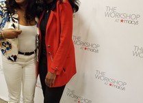 Two women in front of a "Workshop at Macy's" backdrop