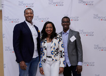 Three conference attendees in front of a "The Workshop at Macy's" backdrop