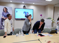 Conference attendees talking around a table