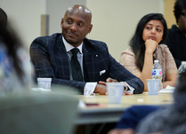A man listening to what is being discussed