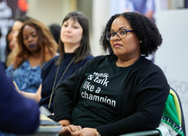 A woman listening to what is being discussed