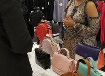 Product representative talking with interested attendee