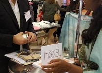 Product representative talking with interested attendee