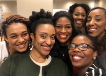 Six women gather together for a smiling selfie