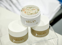 Three stacked containers of plant-based Vegan Foot nanny product