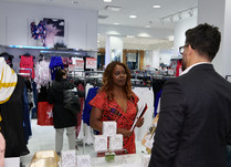 Product representative talking with interested attendee