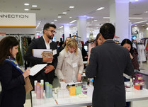 Product representative talking with interested attendees