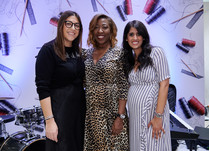 Three women posing for a photo