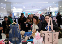 Attendees looking at dog products