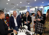 Group gathered around product table