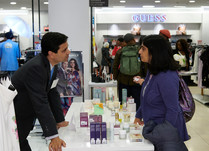 Product representative talking with interested attendee