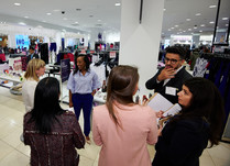 Product representatives talking with interested attendees