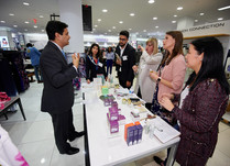 Product representative talking with interested attendees