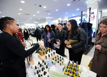 Product representatives talking with interested attendees