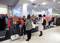 Product representatives talking with interested attendees