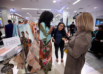 Product representatives talking with interested attendees