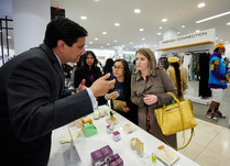 Product representatives talking with interested attendees