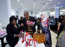 Product representatives talking with interested attendees