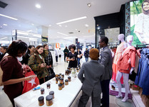 Product representatives talking with interested attendees
