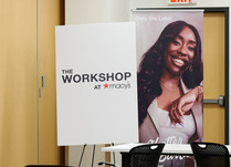 The Workshop at Macy's sign on an easel