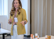 Woman presenting Forgotten Skincare