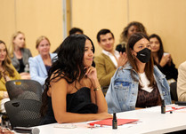 Workshop attendees engaged in conversation 