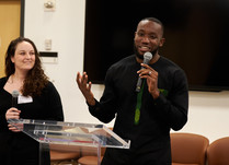 Man and woman presenting to workshop attendees 