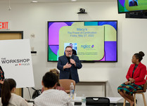 A man presents to workshop attendees