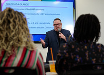 A man presents to workshop attendees