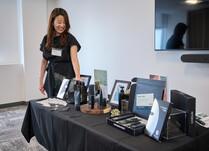 A woman looking at her Cardon products 