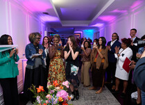 A group of workshop attendees celebrating