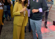 A man and a woman smiling for a photo