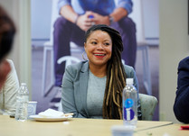 A woman smiling